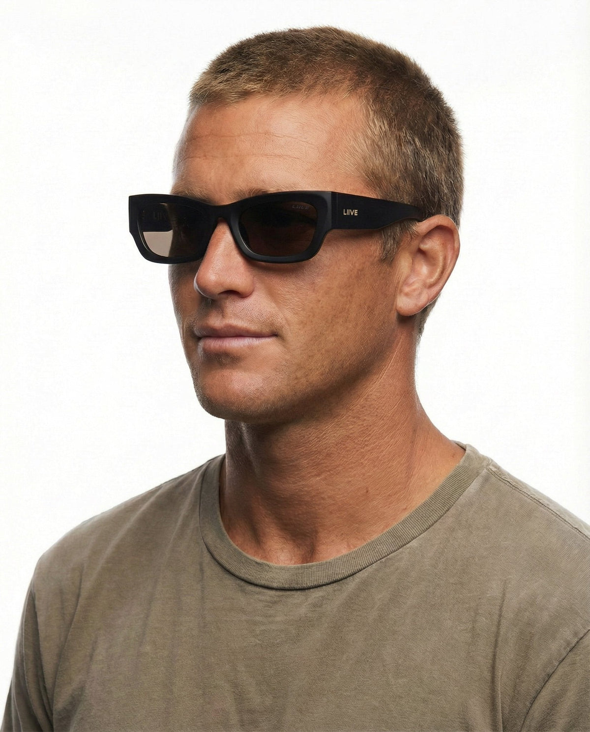 Liive Legian Polarised Matt Black sunglasses worn - Beachin Surf