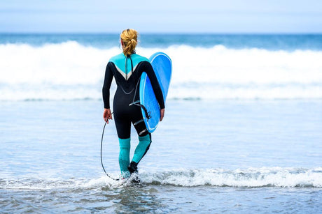 Why Is It Important To Wear A Wet Suit When Surfing? - Beachin Surf