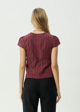 Ledger Wrap Top
