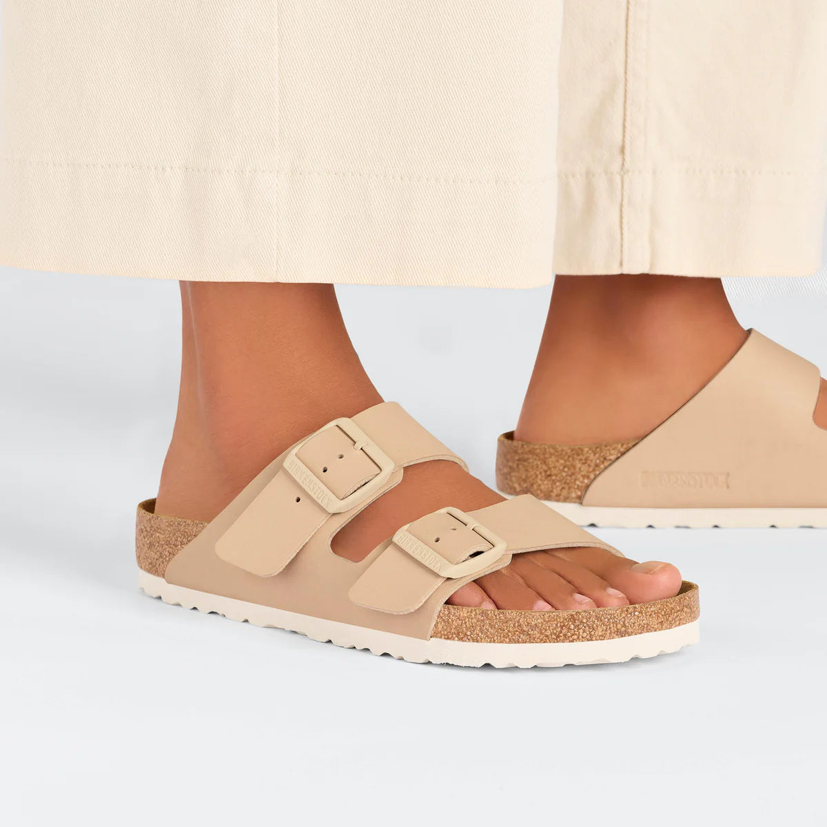Birkenstock Arizona Birko-Flor in New Beige worn on foot, second view - Beachin Surf Toukley
