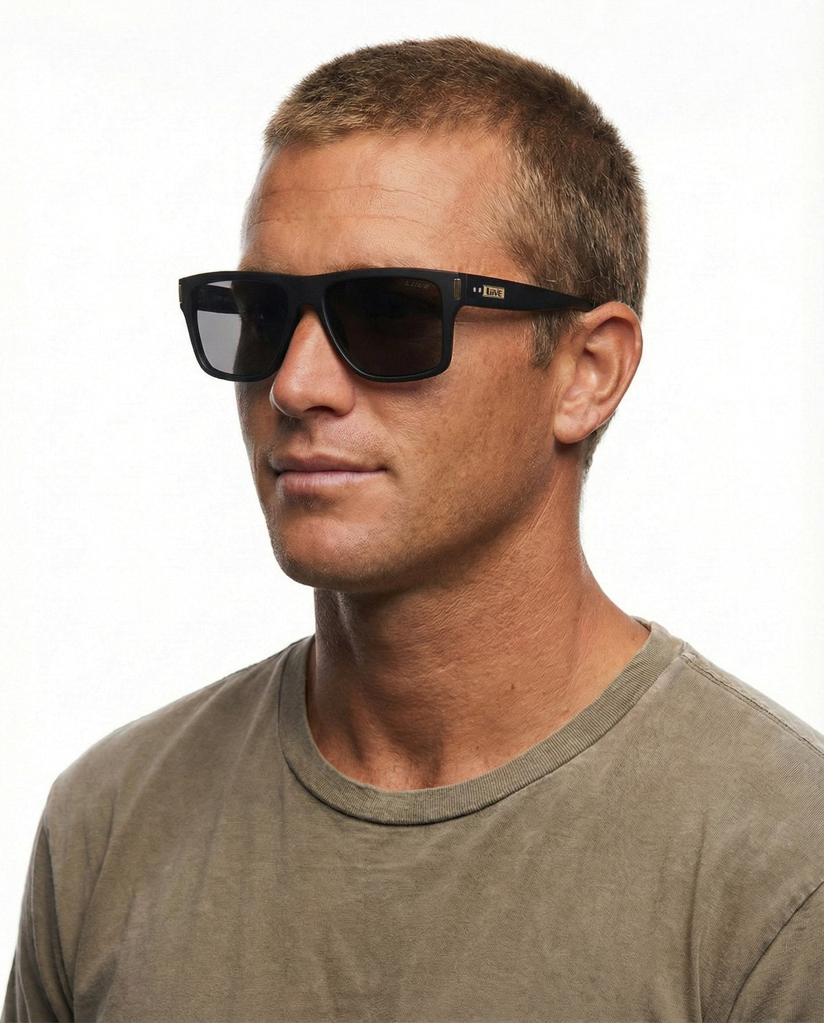 Liive Casino Polarised Matt Black sunglasses worn - Beachin Surf
