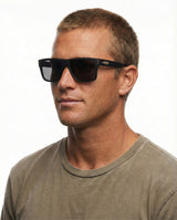 Liive Casino Polarised Matt Black sunglasses worn - Beachin Surf